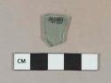 Aqua flat glass fragment, likely window glass