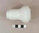 White pressed milk glass bottle, nearly intact, diamond and striation pattern, pear shaped, threaded finish, possible salt/pepper shaker or talcum powder shaker