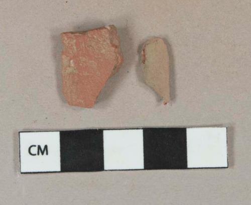 Unglazed redware fragment, possible roof tile or tile fragment