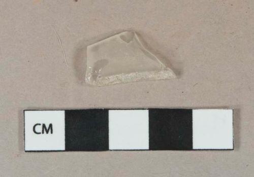 Colorless glass vessel body fragment, frosted