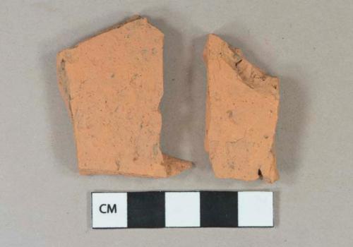 Unglazed redware vessel body fragment, fragments mend