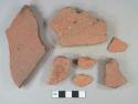 Red ceramic roof tile fragments, portion of hole, 1 fragment burned