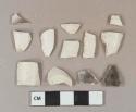 White undecorated kaolin pipe bowl fragments, 4 fragments burned