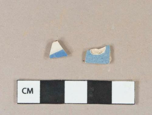 Blue and white pearlware vessel body fragments, white or light buff paste, possible factory decorated slipware