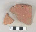 Red brick fragments, 1 fragment possibly roof tile