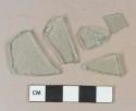 Light aqua flat glass fragments; 1 light aqua glass vessel body fragment