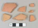 Unglazed redware vessel body and rim fragments, possible terracotta flowerpots