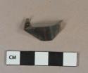 Metal alloy sheet fragment, likely tin