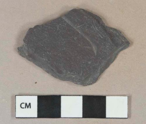 Dark bluish gray slate fragment, possible roofing slate