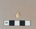 Earthenware vessel body fragment, buff paste, not glazed but likely formerly tin glazed