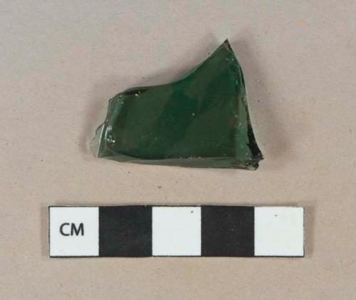 Dark teal green vessel body glass fragment