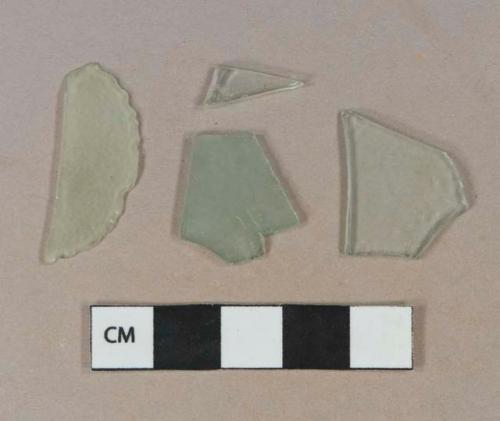 Light aqua flat glass fragments; 1 light aqua vessel glass body fragment