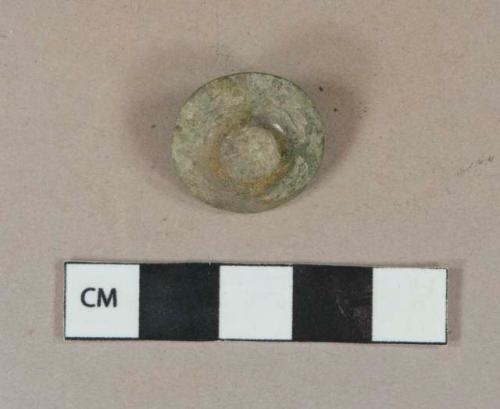 Copper alloy round dome button with shank, intact, engraved with leaves, molded lettering on interor "R. H.  GOLD / COLOR, lightly corroded