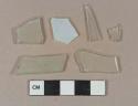 Colorless flat glass fragments, 1 heavily patinated