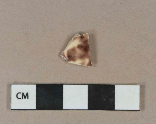 Brown on cream spatter decorated lead glazed earthenware vessel body fragment, light buff paste, likely clouded or Whieldon type