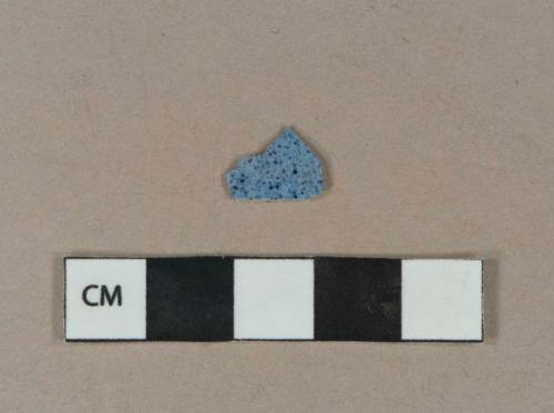 Dark blue on light blue speckled lead glazed earthenware vessel body fragment, white paste