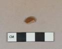 Reddish brown lead glazed redware vessel body fragment