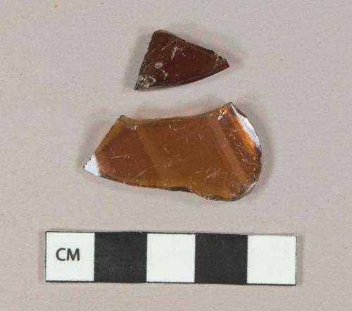 Amber glass vessel body fragments, likely bottle glass