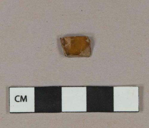 Light amber vessel glass body fragment