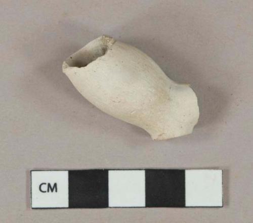 Pipe, white kaolin, bowl fragment; 8/64" bore diameter; bulbous shape, light rouletting around rim