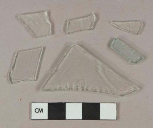 3 colorless flat glass fragments, 2 very light aqua flat glass fragments