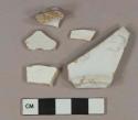 2 white undecorated tin-glazed earthenware vessel body fragments, buff paste; 2 white undecorated pearlware vessel body fragments, white paste; 1 white undecorated ironstone vessel base fragment, white paste