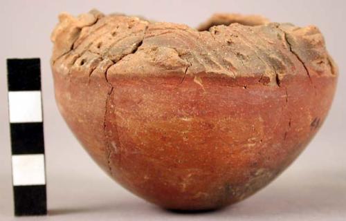 Small fragmentary pottery vessel with incised designs