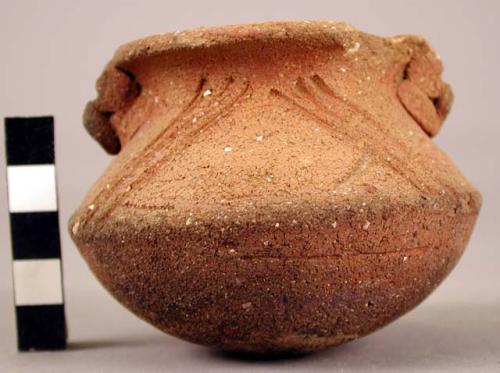 Small pottery vessel with 2 handles and incised lines