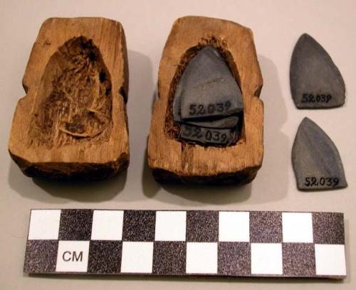 Wooden box containing 6 slate harpoon points