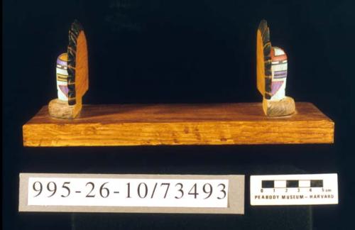 Pair of wooden kachina bookends attached to base