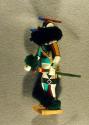 Salimopia kachina of cottonwood root with multi-colored squares on torso