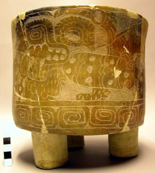 Large plain brown flat-bottomed straight-sided tripod pottery bowl (restored)