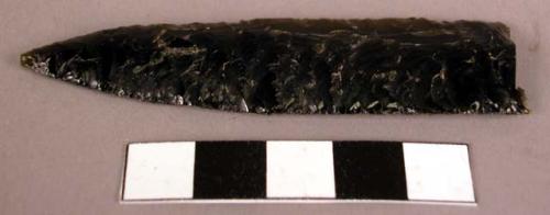 Chipped blade of green obsidian