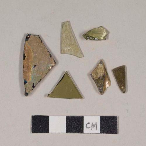 Olive green bottle glass fragments, some heavily patinated