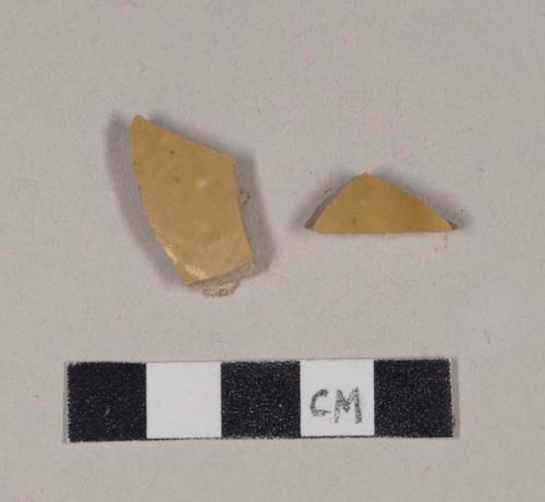 Buff-bodied stoneware body sherds, with white-glazed interior and tan-glazed exterior