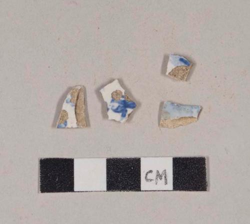 Blue transfer printed whiteware body sherds; three sherds crossmend