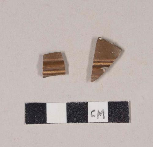 Nottingham-type stoneware body sherds; two sherds crossmend