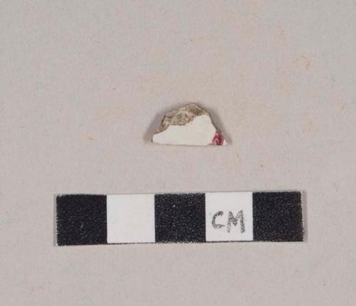 Molded, pink hand painted pearlware body sherd