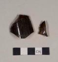 Glass, amber bottle glass fragments; two fragments crossmend