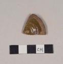 Undecorated lead glazed redware base sherd