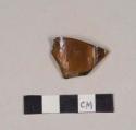 Glass, amber bottle glass fragment