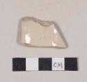 Undecorated buff-bodied, buff-glazed stoneware body sherd