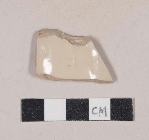 Undecorated buff-bodied, buff-glazed stoneware body sherd