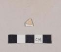 Whiteware body sherd with unidentified blue decoration