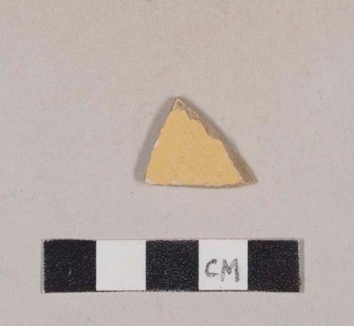 White slip decorated yellow ware body sherd