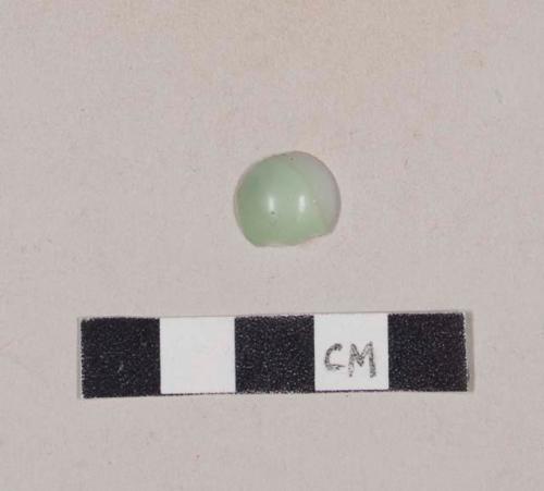 White and green milk glass fragment, possibly fragment of a marble