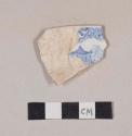 Blue transfer printed whiteware rim sherd