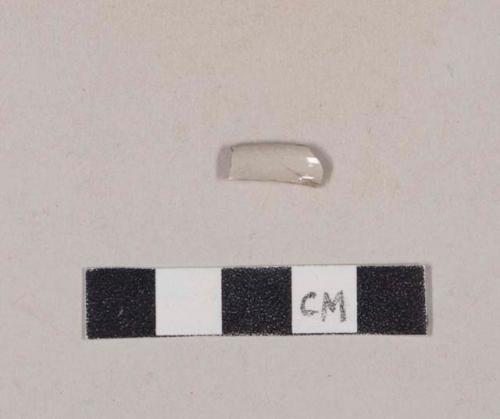 Buff-bodied, gray glazed refined earthenware rim sherd with possible blue decoration