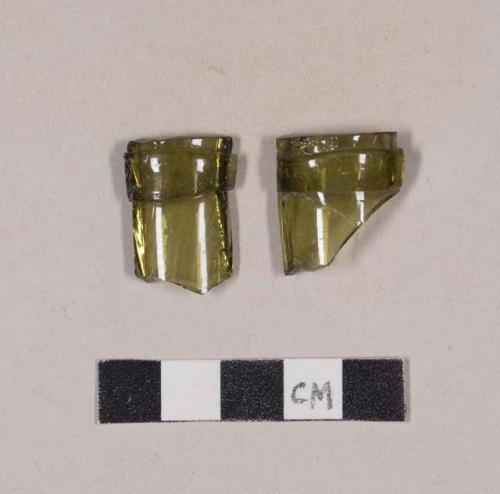 Olive green bottle glass rim fragments with applied champagne finish; two fragments crossmend