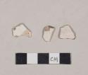 Undecorated whiteware body sherds; two sherds crossmend